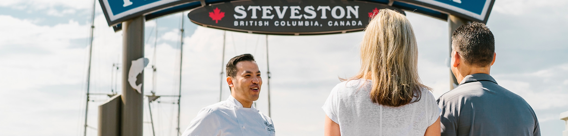 a chef giving guest a tour of the pier