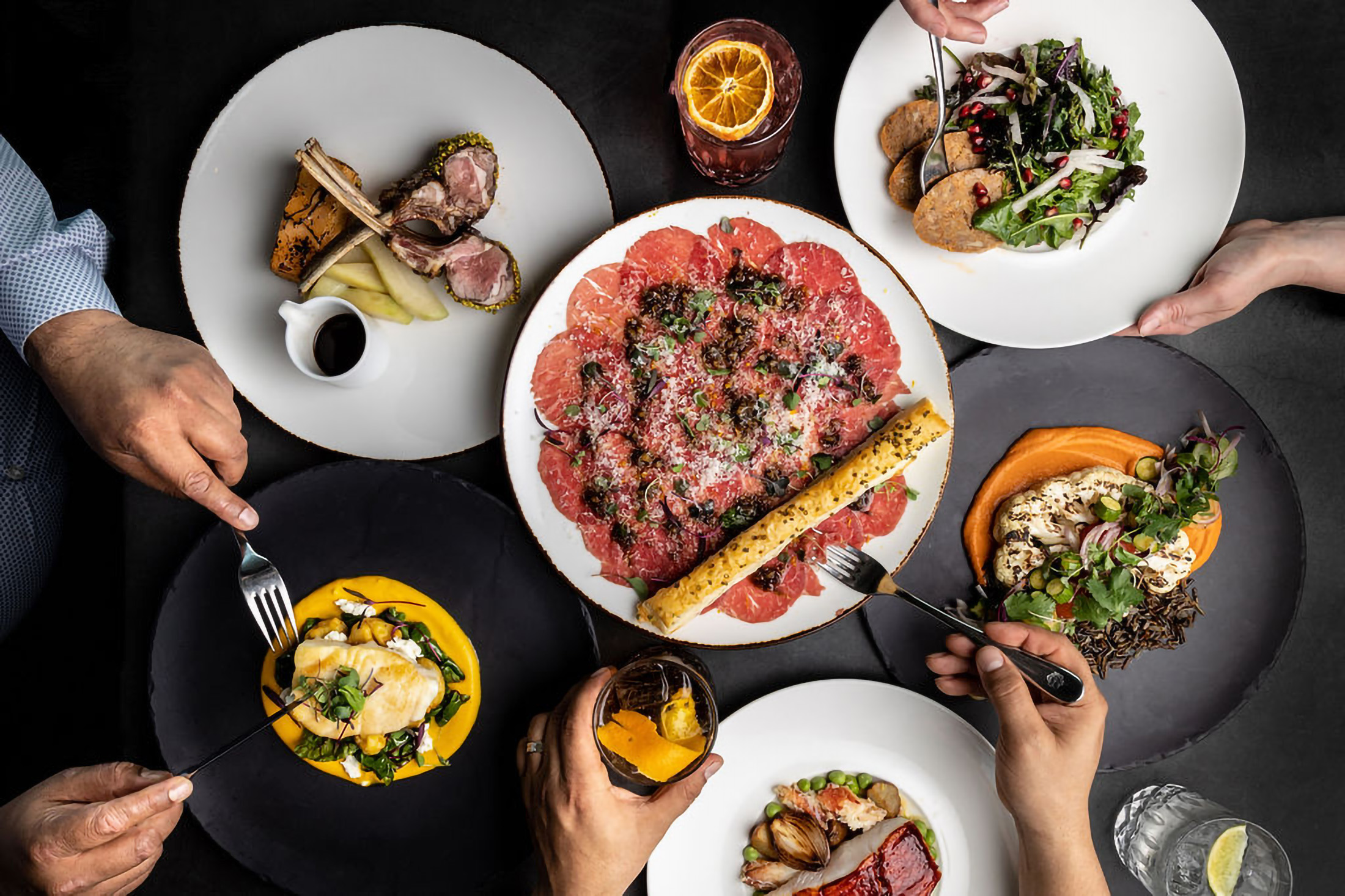 table scape of different plates of food