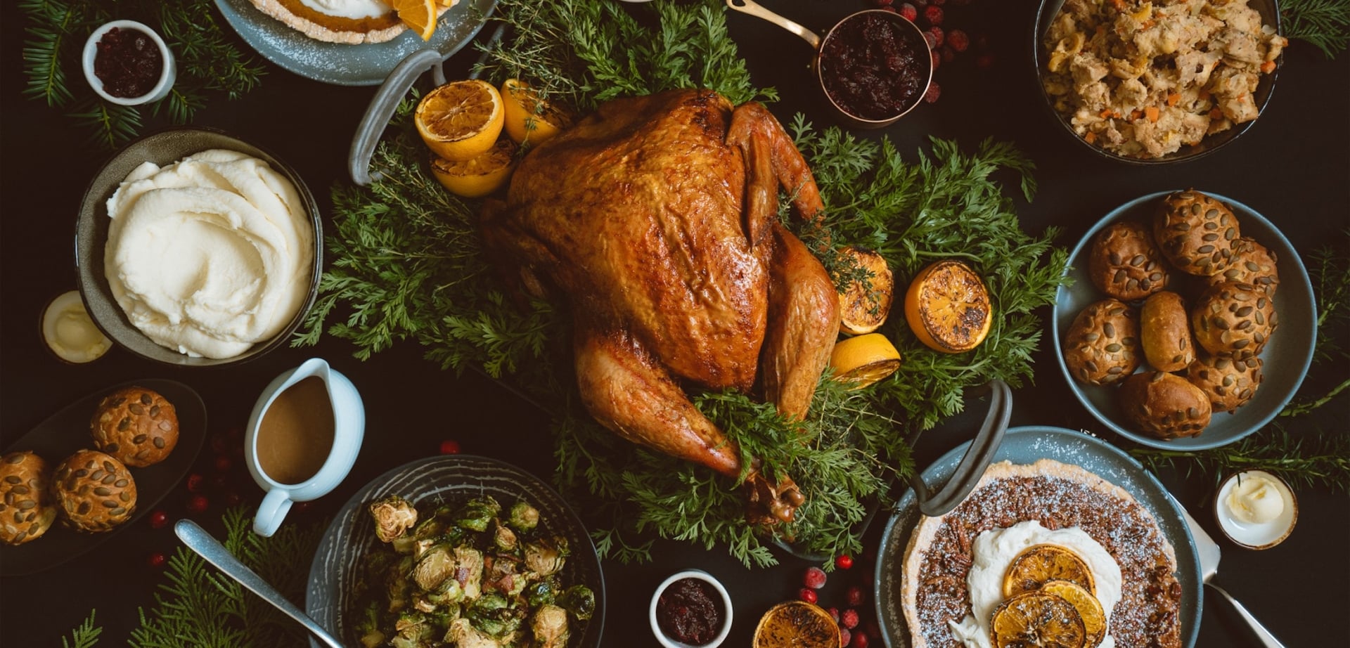 table scape of dinner food with festive decorations