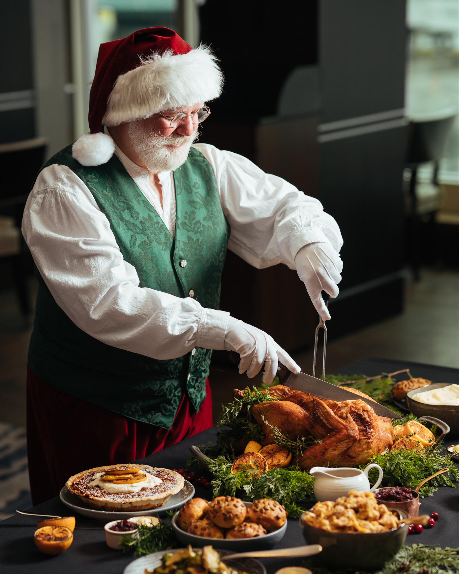 santa cutting a turkey