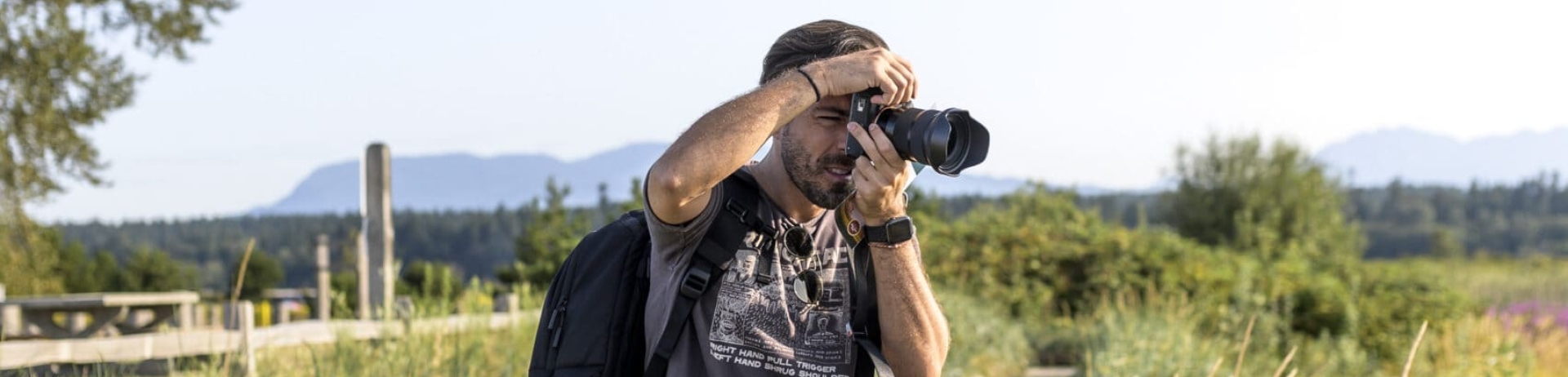 man taking a photograph