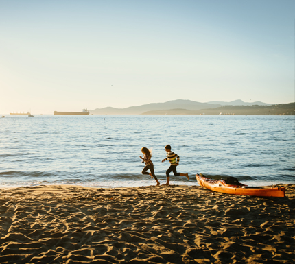 people running on the beach