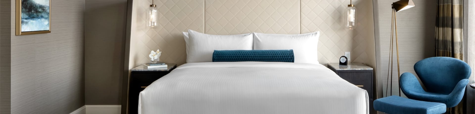 bedroom with a chair and bench