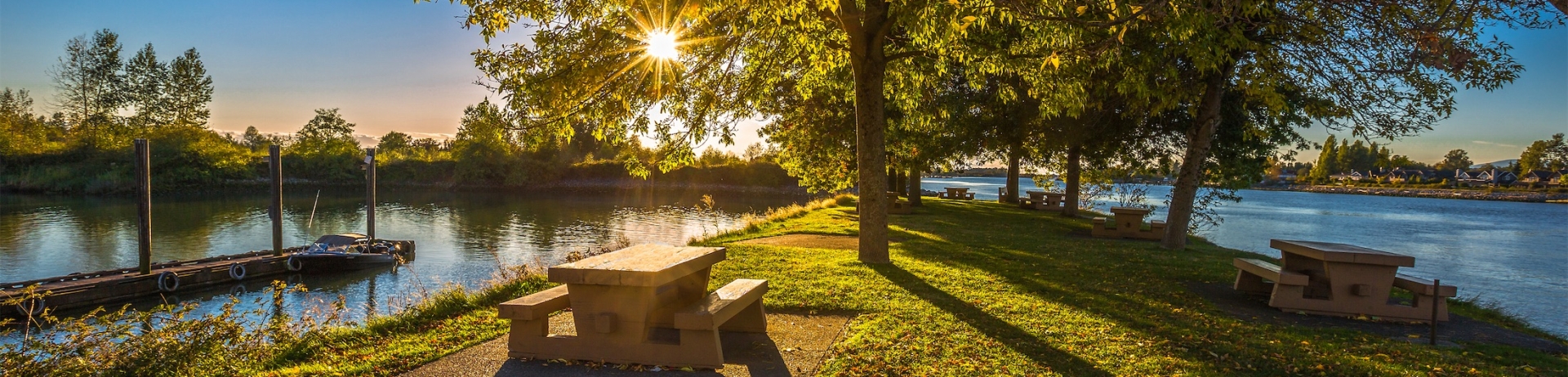 picnic bench at park and sunset